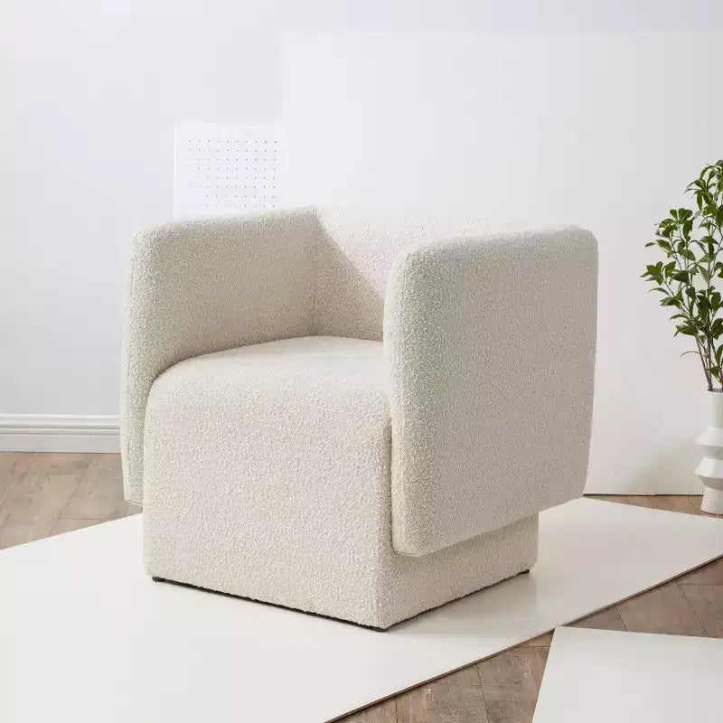 Fauteuil à dossier incurvé